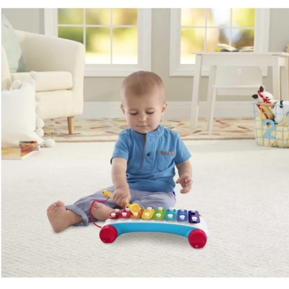 Fisher-price pull toy, xylophone musical instrument with mallet rolling
